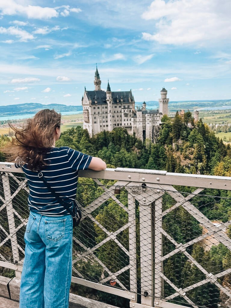 The bridge from which you can take the iconic photo of Neuschwanstein Castle is called Marienbrücke (Mary's Bridge). It spans a gorge above the Pöllat River and offers breathtaking views of the castle with the surrounding Bavarian Alps. The bridge is named after Queen Marie of Prussia, King Ludwig II's mother. It's a must-visit spot for photographers and nature lovers visiting the area!