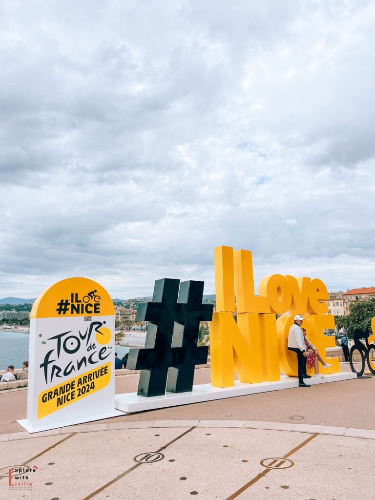 The sign in 3D yellow letters saying "We Love Nice", at the end of the promenade facing the sea